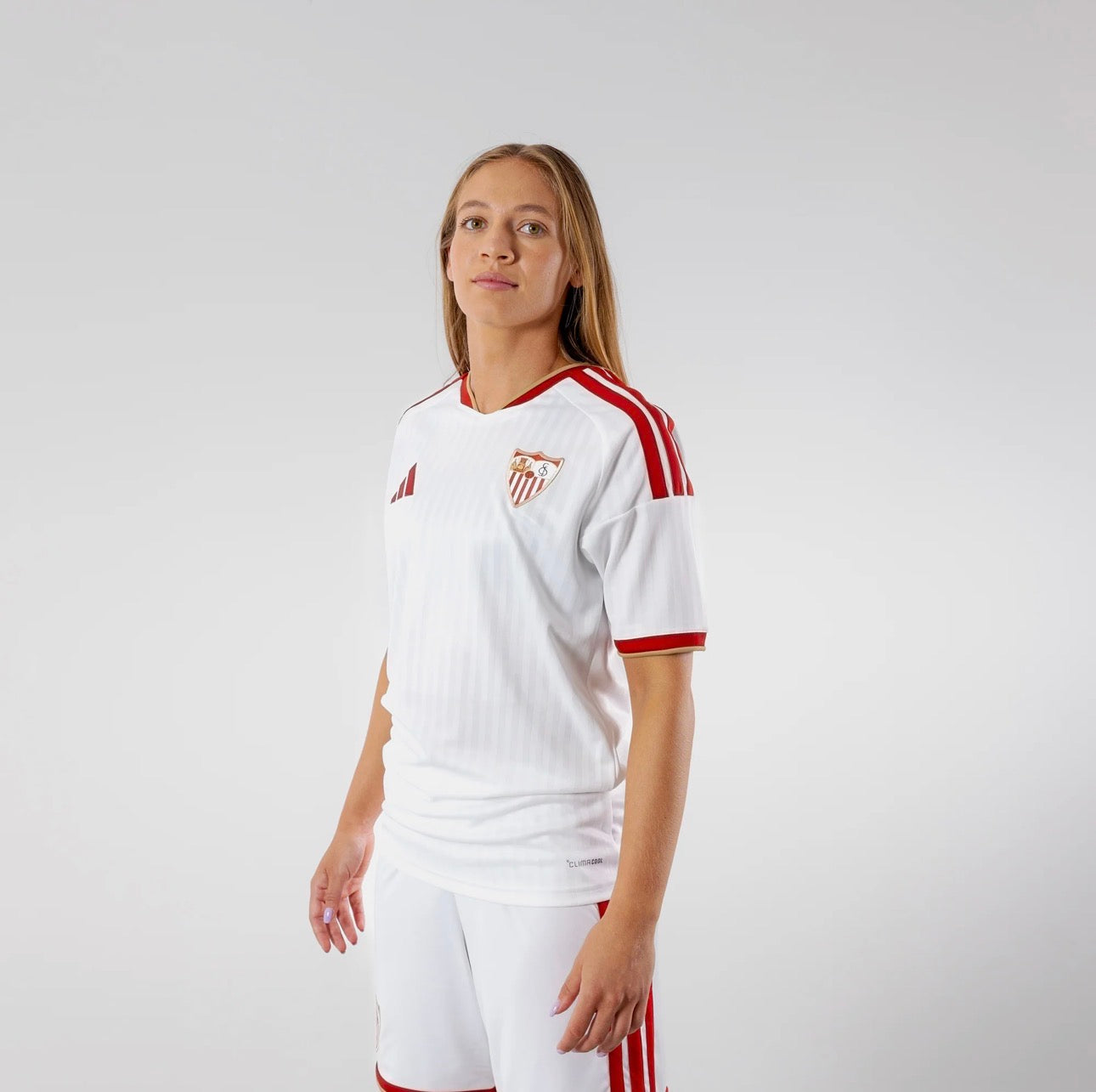 CAMISOLA SEVILLA FEMININA PRINCIPAL 2026/27
