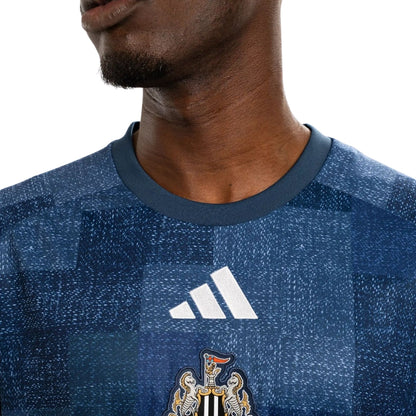 CAMISOLA NEWCASTLE UNITED PRINCIPAL 2026/27 AQUECIMENTO